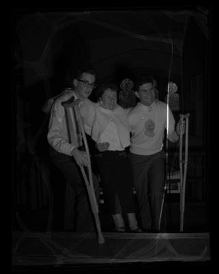 Irma Stover, high school student, being aided by Intercollegiate Knights.