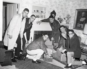 Image of Intrafraternity Council students preparing Thanksgiving baskets.