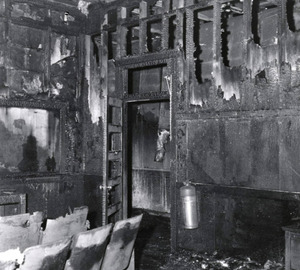 Photo of a fire extinguisher left [v]ery untouched by a fire