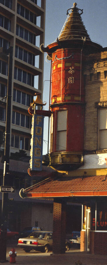This close up view of Fongs building in Old China Town, Boise, Idaho received a score of 39 by the Columbia Council of Camera Clubs. On the corner of the building is a blade neon sign.