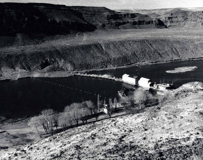 This image of floating trailers on a lake surrounded by hills and trees was entered into the Boise Camera Club and received a score of 23.