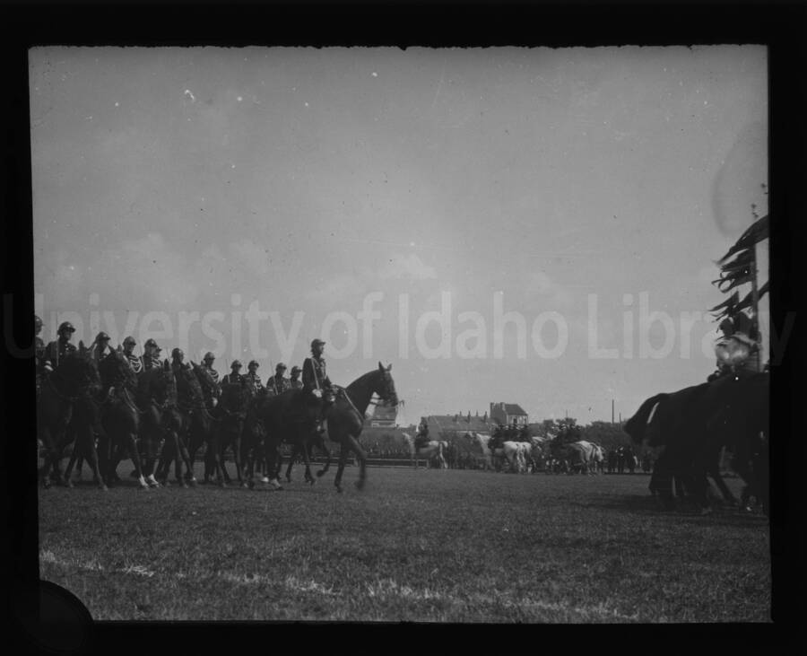 Cavalry parade in an open field near the University of Idaho.