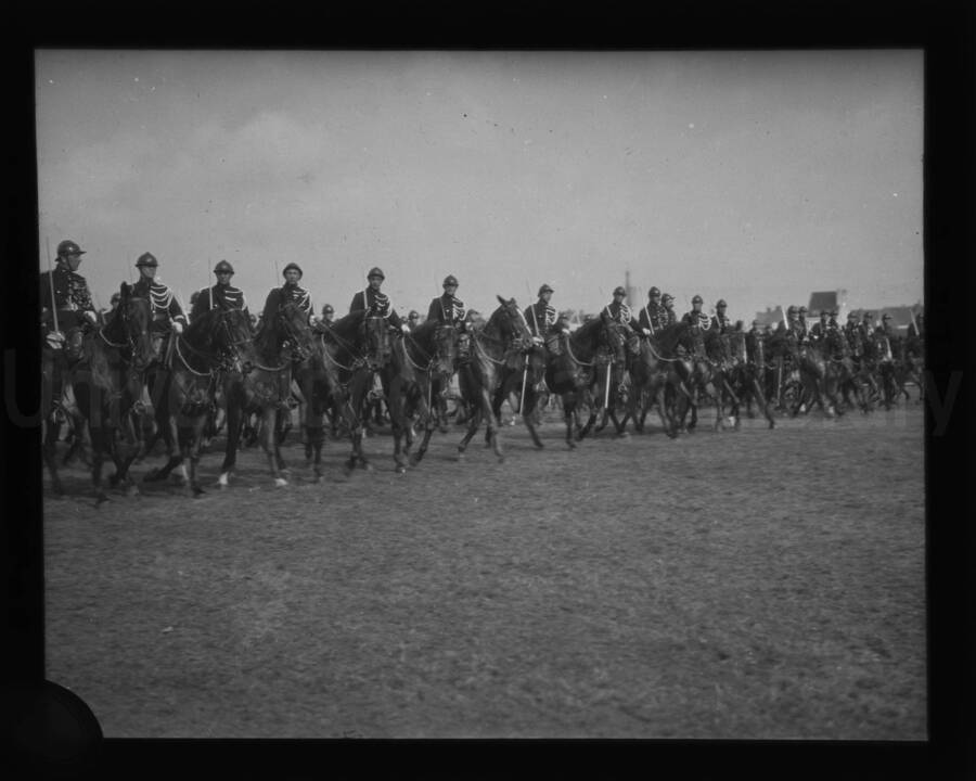Cavalry on parade in an open field near the University of Idaho.