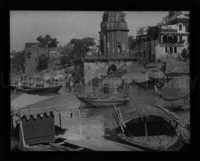 Ganges River in India. People and boats can be seen in the busy thoroughfare.