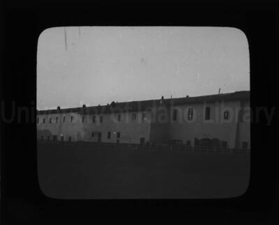 A building. Inscription in Italian above one of the doors reads: Stalla (stable).