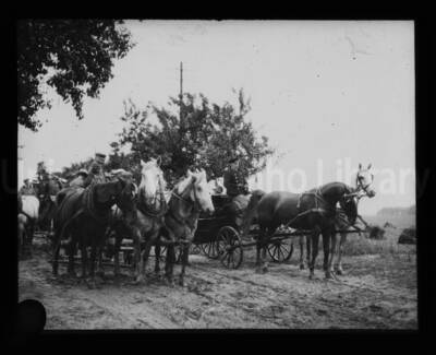 Four-wheeled carriages pulled by teams of horses with drivers and passengers.
