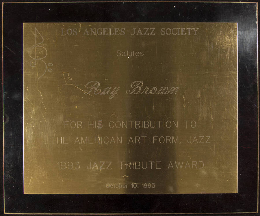 Los Angeles Jazz Society salutes Ray Brown for his contribution Jazz Tribute Award, 1993.  10 x 12 inch wood finish plaque with engraved plate.