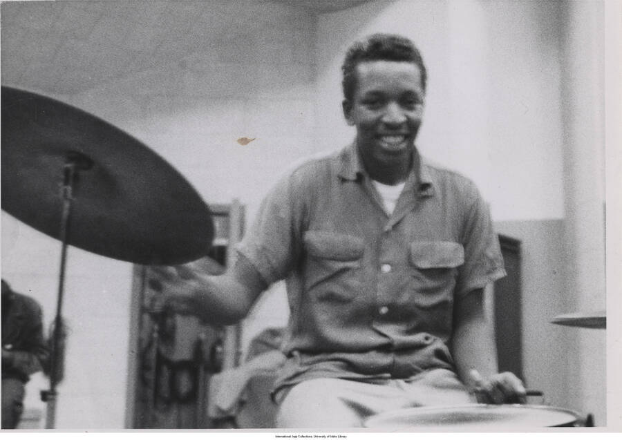 5 x 7 inch photograph; Larry Marable playing the drums