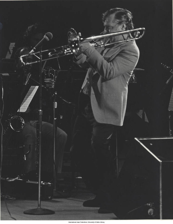 10 x 8 inch photograph; Rob McConnell playing the trombone. Also a close-up of the same photograph