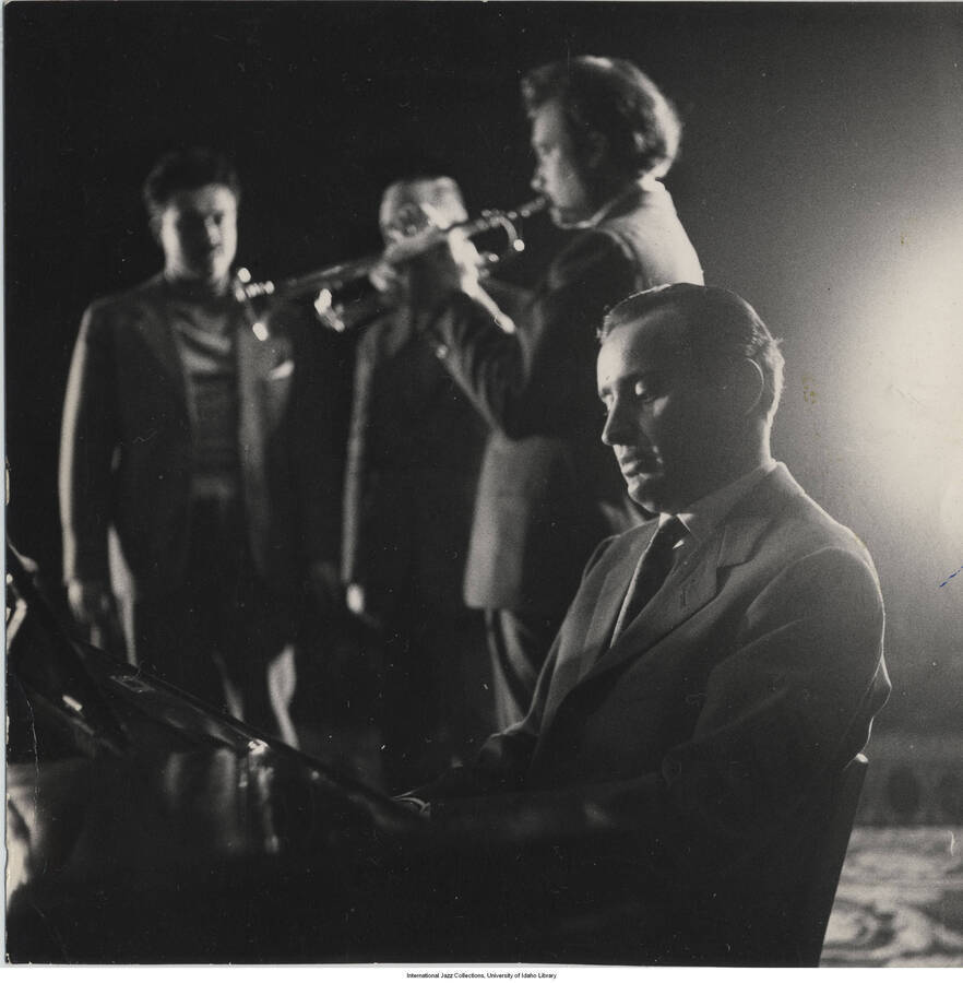 5 x 5 inch photograph; Romano Mussolini playing the piano and Nunzio Rotondo playing the trumpet