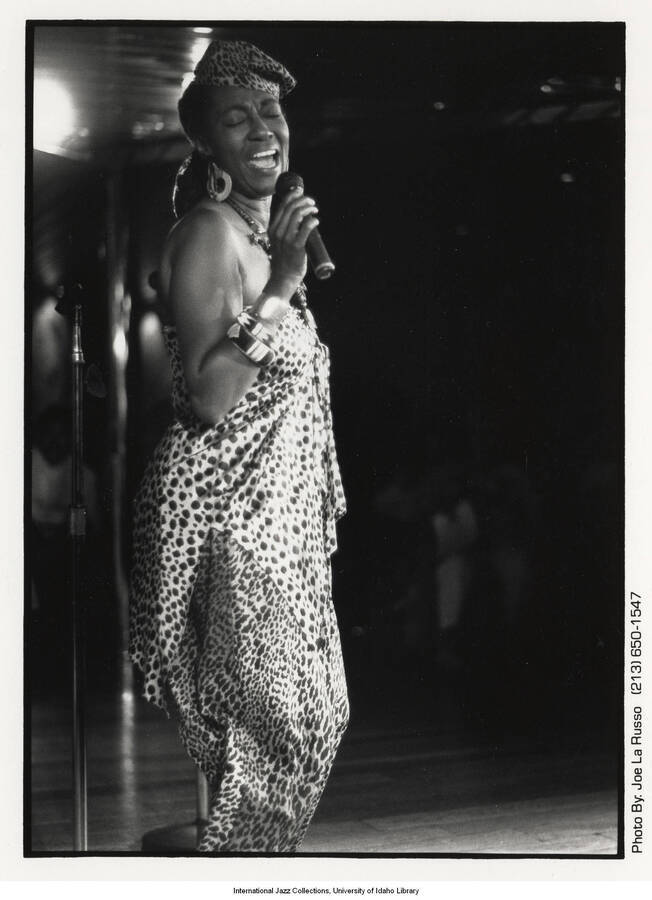 10 x 8 inch photograph; Cele, a jazz vocalist performs on board one of the Regency Cruise ships going from Vancouver, B.C. to Los Angeles, CA. This particular cruise was billed as a jazz cruise.