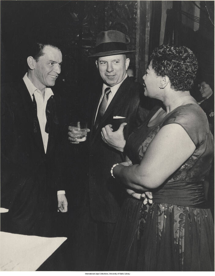 10 x 8 inch photograph; Frank Sinatra, Jimmy Van Heusen, and Ella Fitzgerald. Handwritten on the back of the photograph: at Sinatra Timex TV Show, 1959-12-13