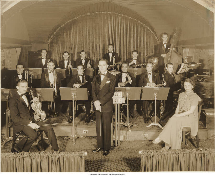 8 x 10 inch photograph; an orchestra. The musicians include Gene Traxler, Charlie Bush, Cliff Weston, Andy Ferretti, Paul Mitchell, Bud Freeman, Toots Mondello, and Paul Ricci