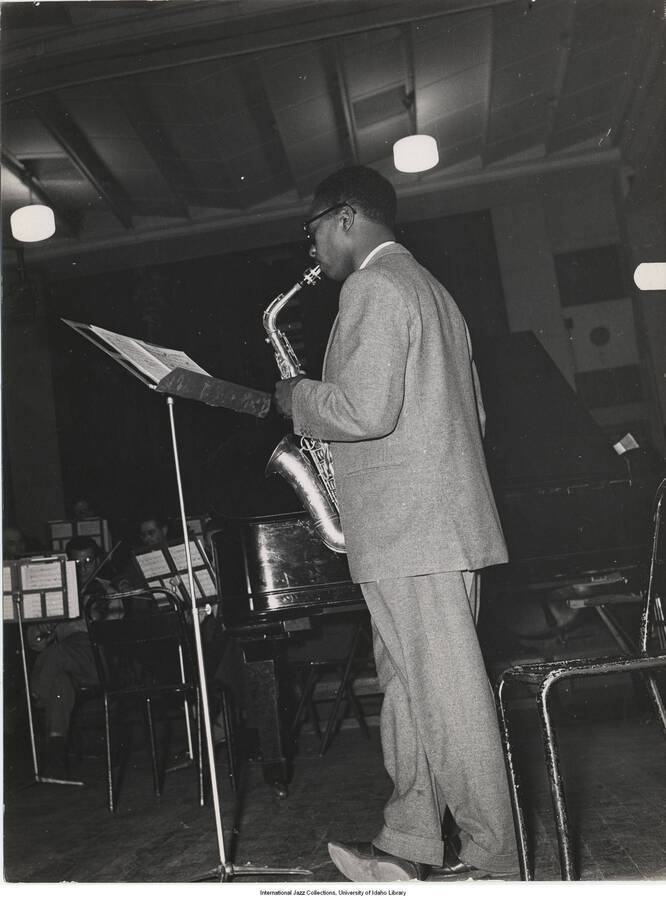 9 1/2 x 7 1/4 inch photograph; unidentified saxophonist