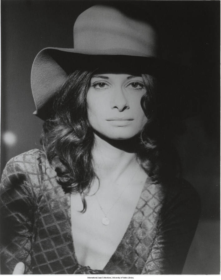 10 x 8 inch photograph; Joanne Grauer wearing a hat (1 duplicate)