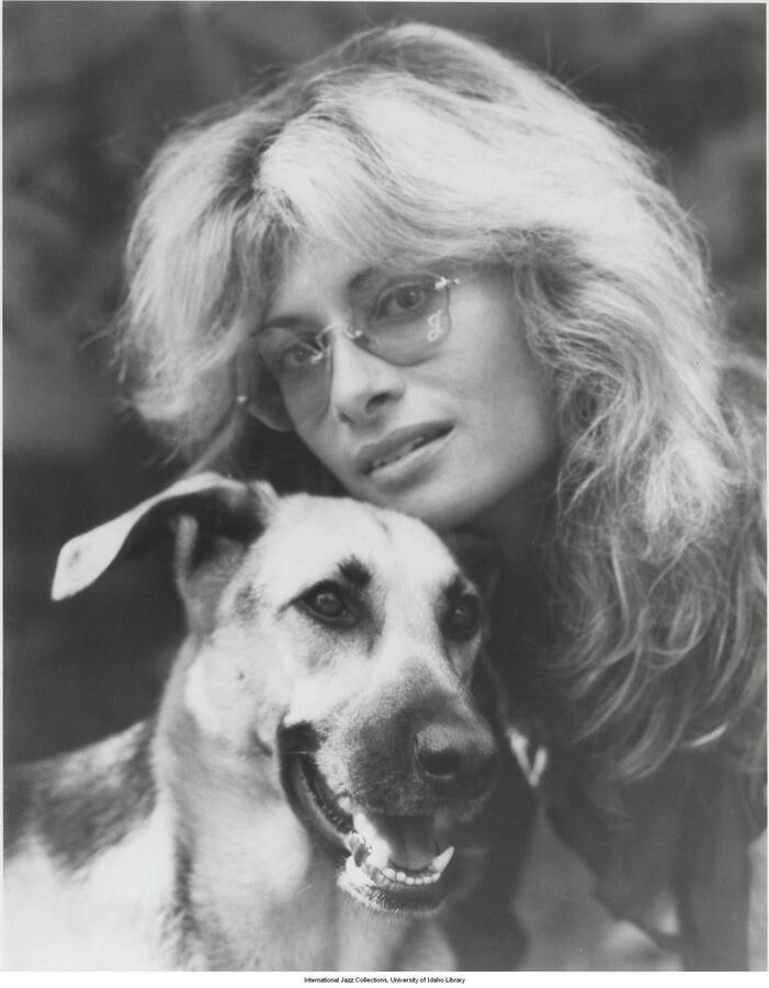 10 x 8 inch photograph; Joanne Grauer with a dog