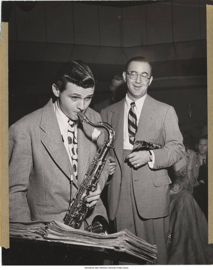 9 1/2 x 7 3/4 inch photograph; Benny Goodman and saxophonist Stan Getz