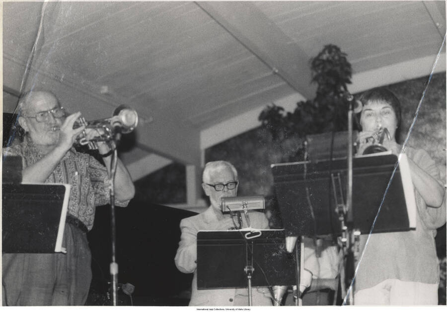 5 x 7 inch photograph; Dick Cary on trumpet and unidentified musicians (1 duplicate)