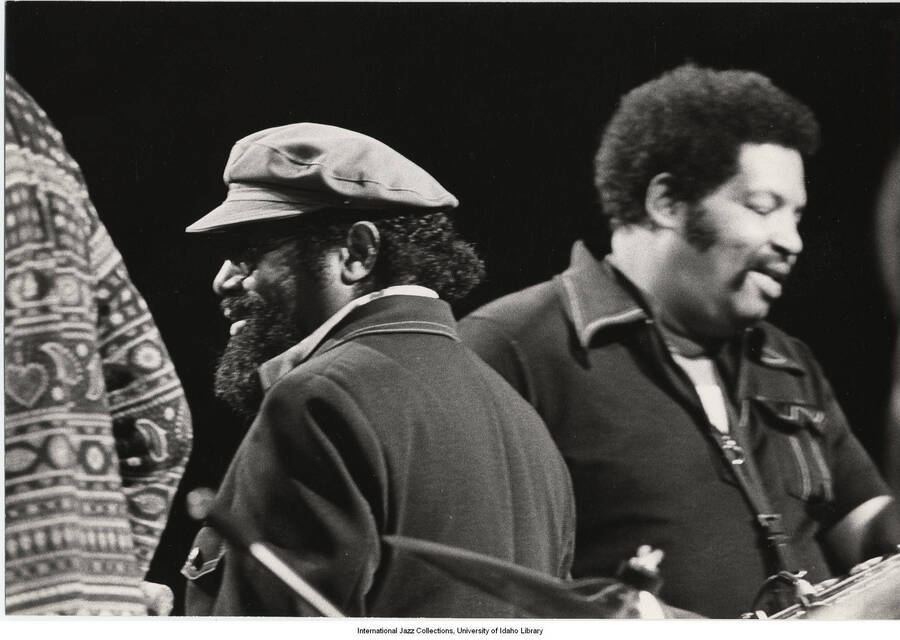 5 1/4 x 7 3/4 inch photograph; cornetist Nat Adderley and alto saxophonist Julian "Cannonball" Adderley performing