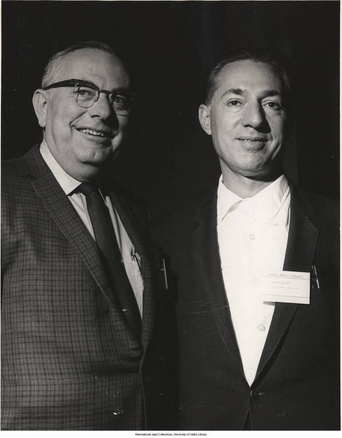 10 x 8 inch photograph; Leonard Feather with an unidentified man. Feather's name tag reads: Youth Music Project; Los Angeles, California; University Extension