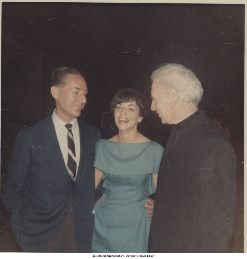 3 1/2 x 3 1/2 inch photograph; Leonard Feather with unidentified man and woman