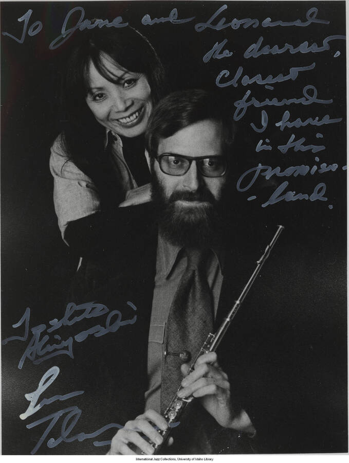 10 x 8 inch signed photograph; Toshiko Akiyoshi and Lew Tabackin. The photograph is dedicated to Jane and Leonard Feather