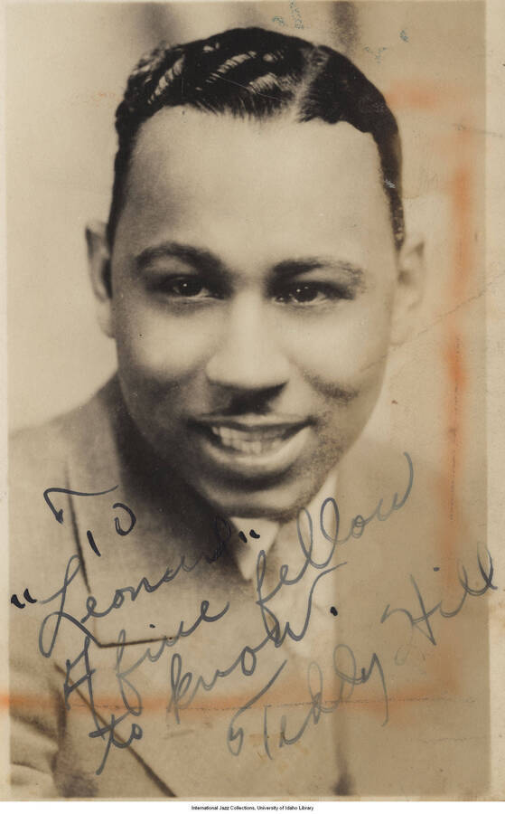 5 1/2 x 3 1/2 inch signed photograph; Teddy Hill. The photograph is dedicated to Leonard Feather
