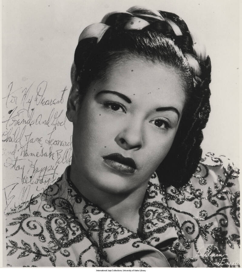 10 x 8 inch signed photograph; Billie Holiday. This is a copy of the photograph dedicated to her friends and godchild, Leonard, Jane, and Lorraine Feather. It is published in Leonard Feather's book The Jazz Years: Earwitness to an era