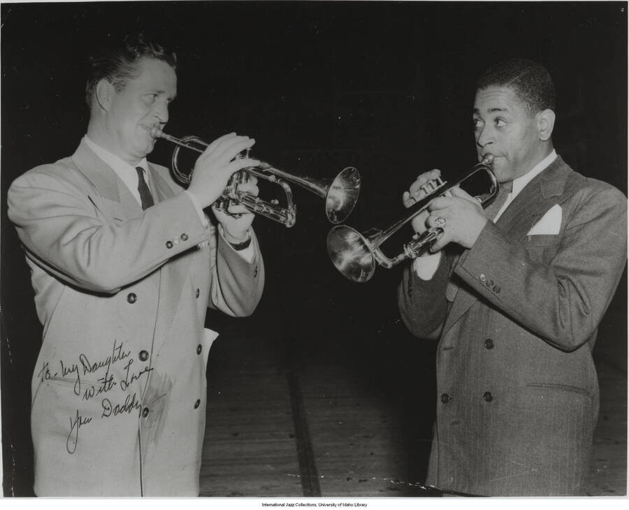 10 x 8 inch signed photograph; Jimmy McPartland and Dizzy Gillespie. The photograph includes a dedication written over the picture of Jimmy McPartland that reads: To my daughter with love. Your Daddy