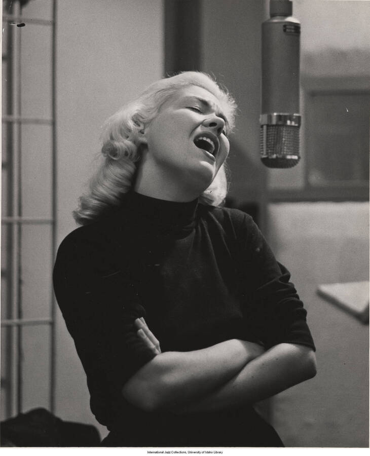 10 x 8 inch photograph; Helen Merrill singing