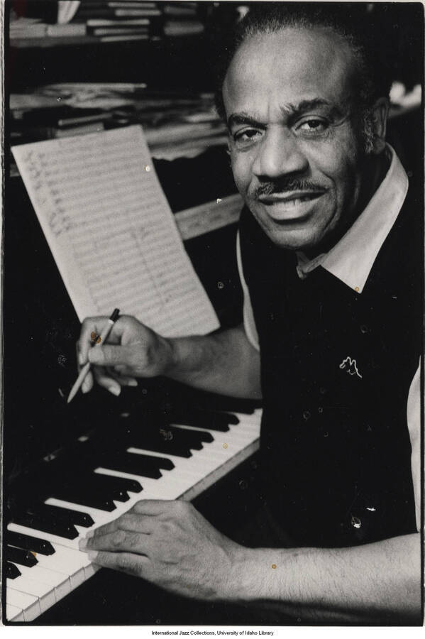 9 1/2 x 7 inch photograph; Billy Moore. This photograph is published in Leonard Feather's book The Jazz Years: Earwitness to an era