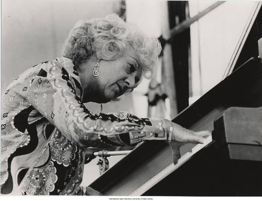 8 x 10 inch photograph; Marian McPartland playing the piano