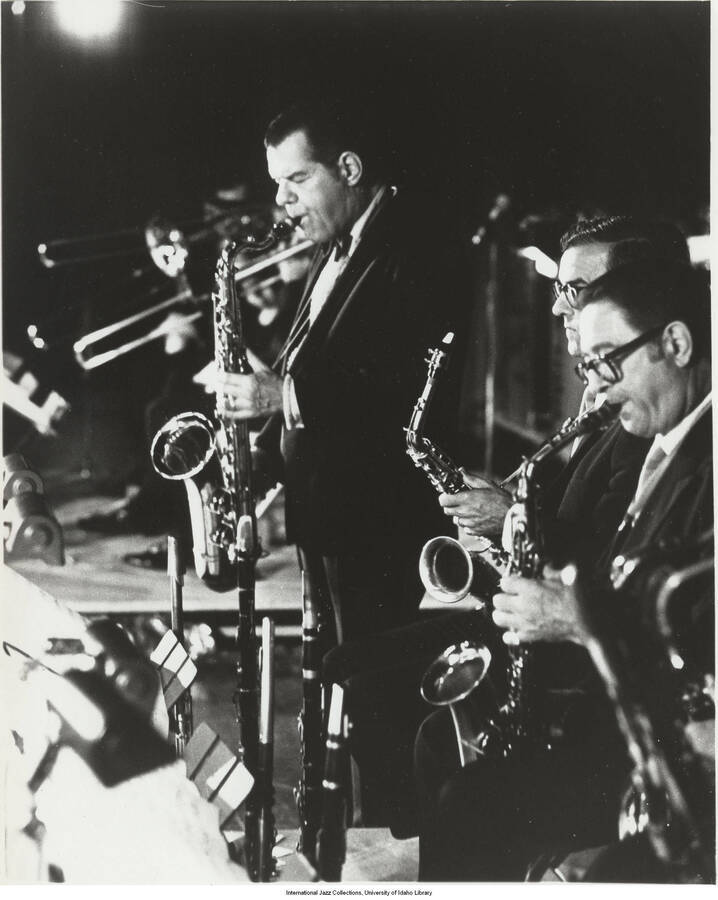10 x 8 inch photograph; Tex Beneke playing the saxophone