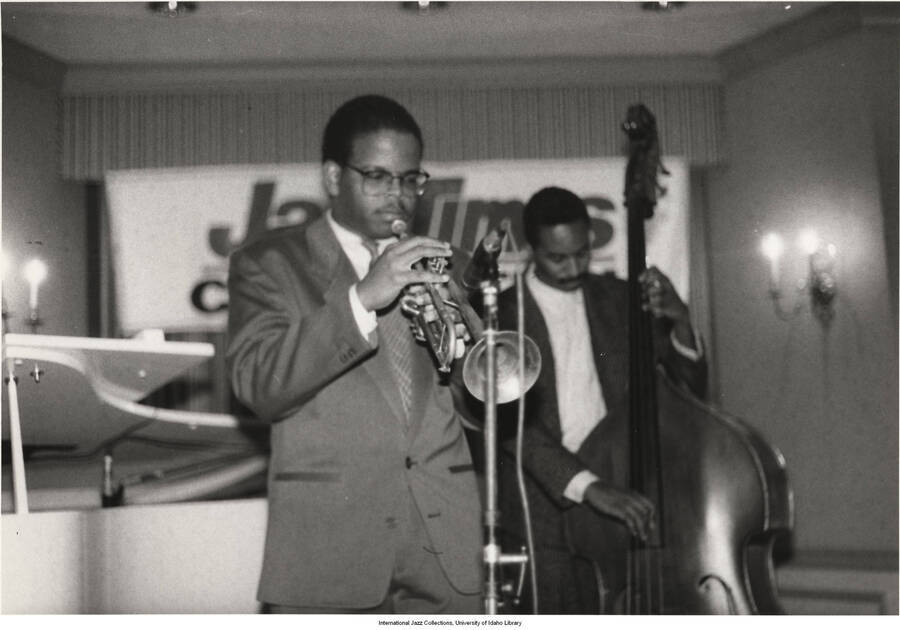 8 x 11 inch photograph; Terence Blanchard and an unidentified bassist. Handwritten on the back of the photograph: Terence Blanchard at Jazz Times Convention