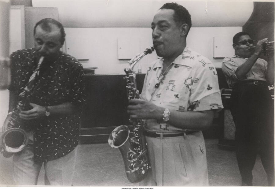10 1/4 x 14 3/4 inch photograph; Flip Phillips, Johnny Hodges, and Dizzy Gillespie. From a 1950s recording session for Verve