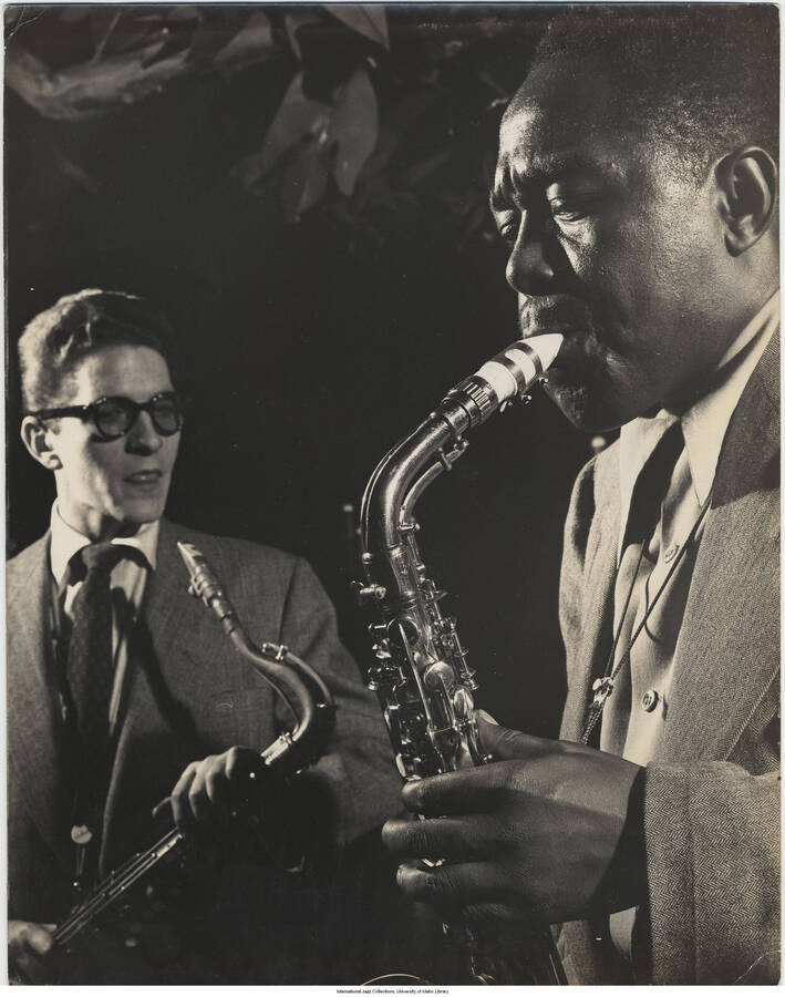 14 x 11 inch photograph; Charlie Parker and Allen Eager, Royal Roost, NYC, 1948
