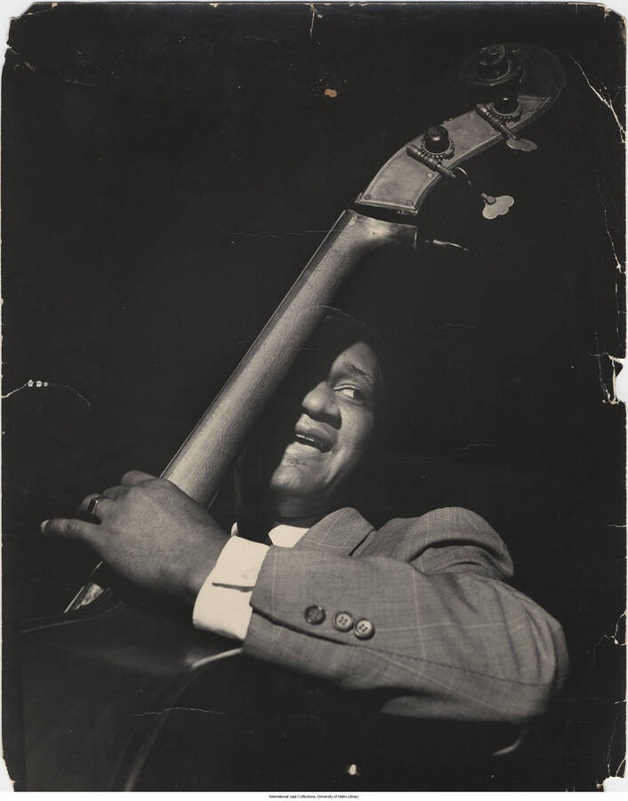 14 x 11 inch photograph; Oscar Pettiford, NYC, 1950
