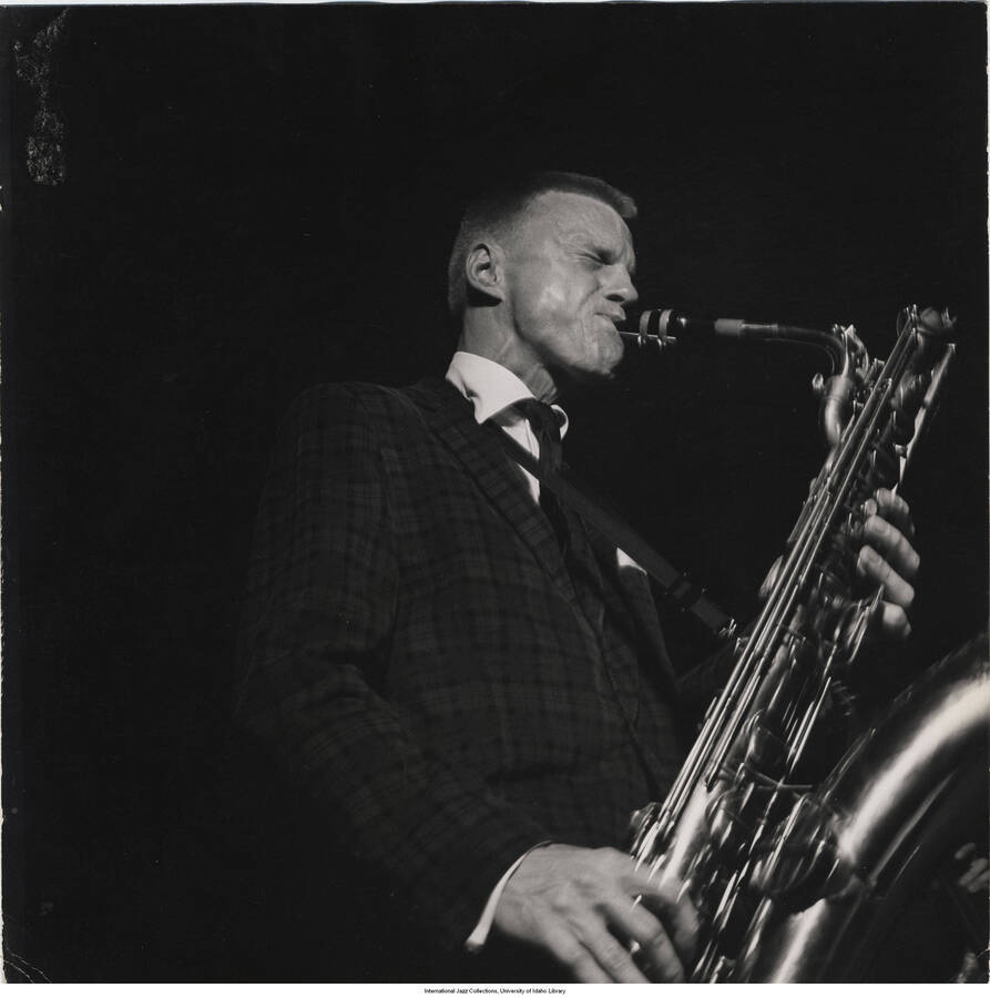 11 x 11 inch photograph; Gerry Mulligan playing the saxophone