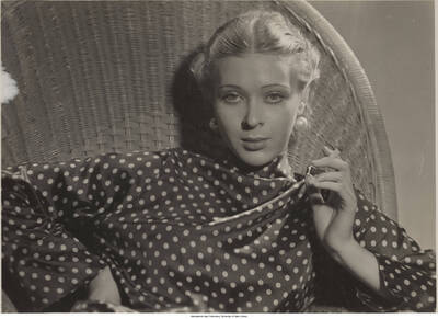 6 x 7 3/4 inch photograph; unidentified woman