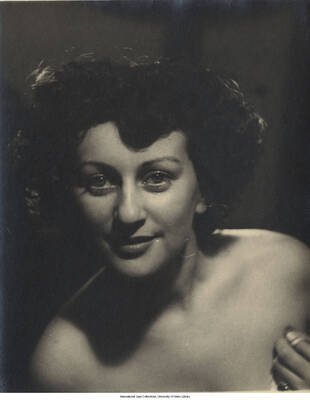 9 1/2 x 7 inch photograph; unidentified woman
