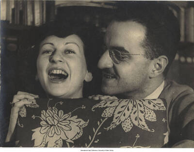 7 x 9 1/2 inch photograph; unidentified woman and a man