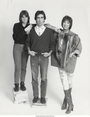 10 x 8 inch photograph; Katie Malloch with unidentified man and woman