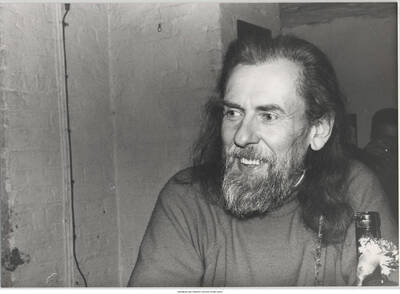 6 x 7 inch photograph; unidentified man in a restaurant