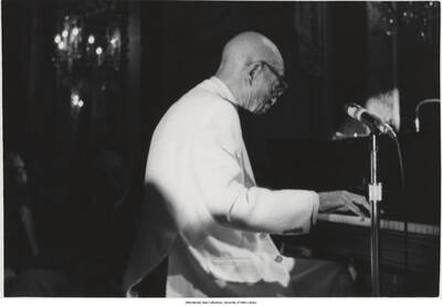 3 1/2 x 5 inch photograph; performing are Eubie Blake and unidentified musicians