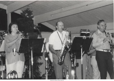 5 x 7 inch photograph; unidentified musicians (1 duplicate is stuck together due to moisture)