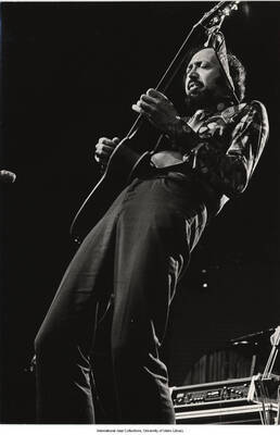 7 3/4 x 5 1/4 inch photograph; Barney Kessel performing at the Montreux Jazz Festival