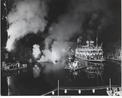 8 x 10 inch photograph; view of a boat carrying musicians on board