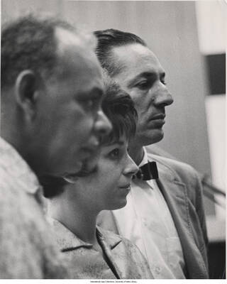 10 x 8 inch photograph; Leonard Feather with unidentified man and woman