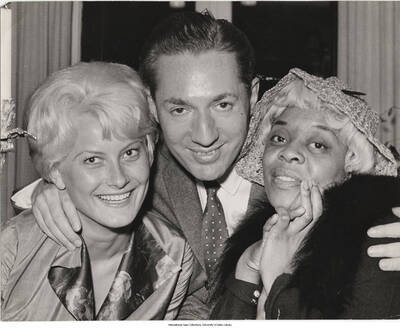 8 x 10 inch photograph; Swedish singer Monica Zetterlund, Leonard Feather, and Dinah Washington, in Stockholm
