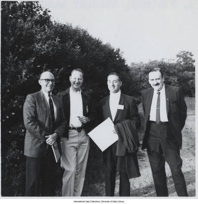 3 1/2 x 3 1/2 inch photograph; Written on the back of the photograph: John S. Wilson, Dan Morgenstern, Leonard Feather, and Stanley Dance; Birds of a Feather